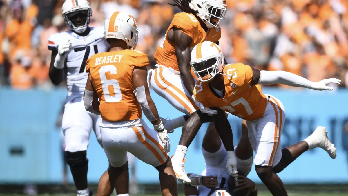 Tennessee Volunteers EDGE James Pearce Jr. celebrating with ILB Aaron Beasley during a win over Virginia. (Photo by Caitie McMekin of the News Sentinel)
